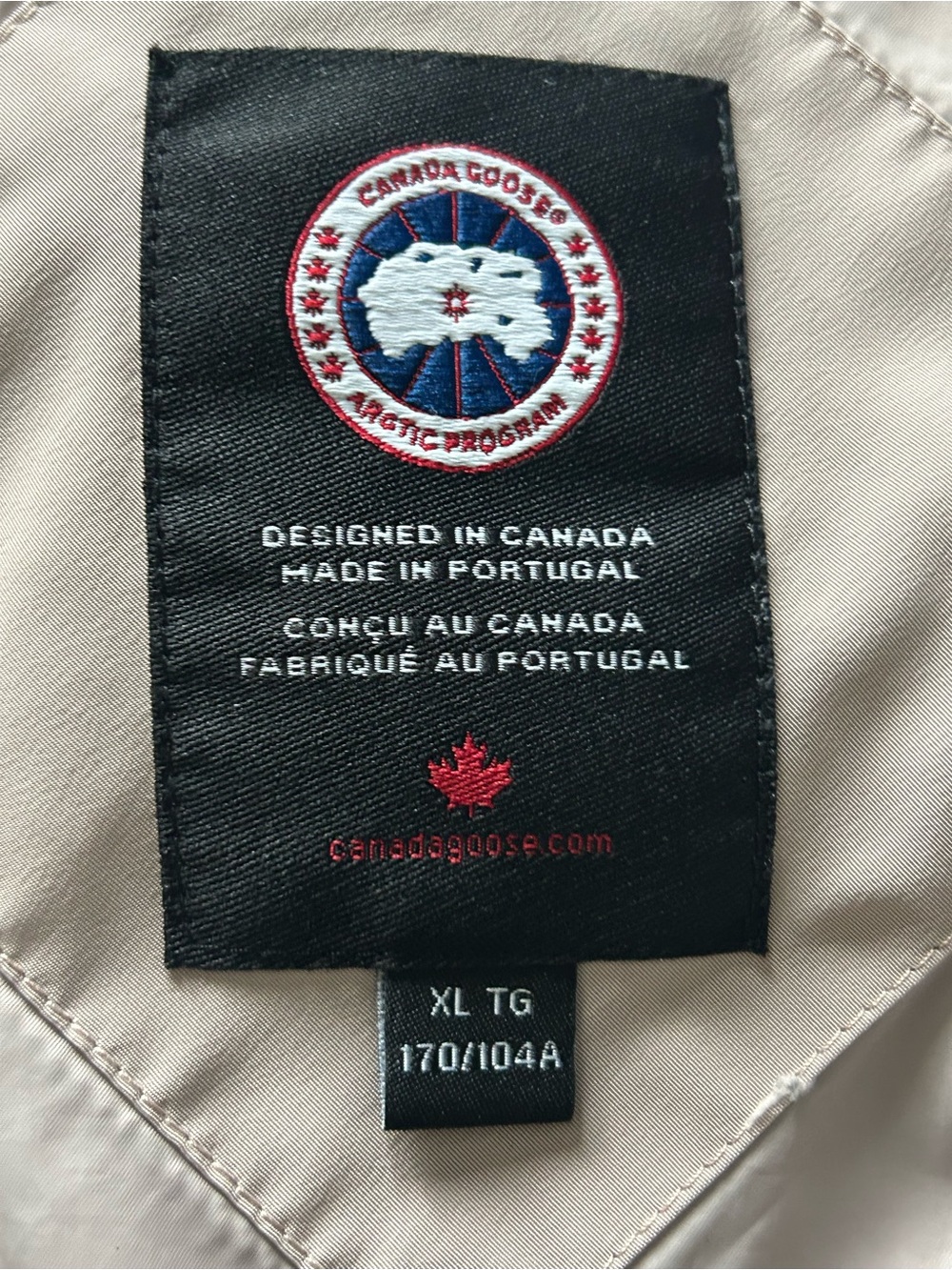 Canada Goose White Care Label with Red Tab Accents with small marks on sleeve. - Picture 3 of 7